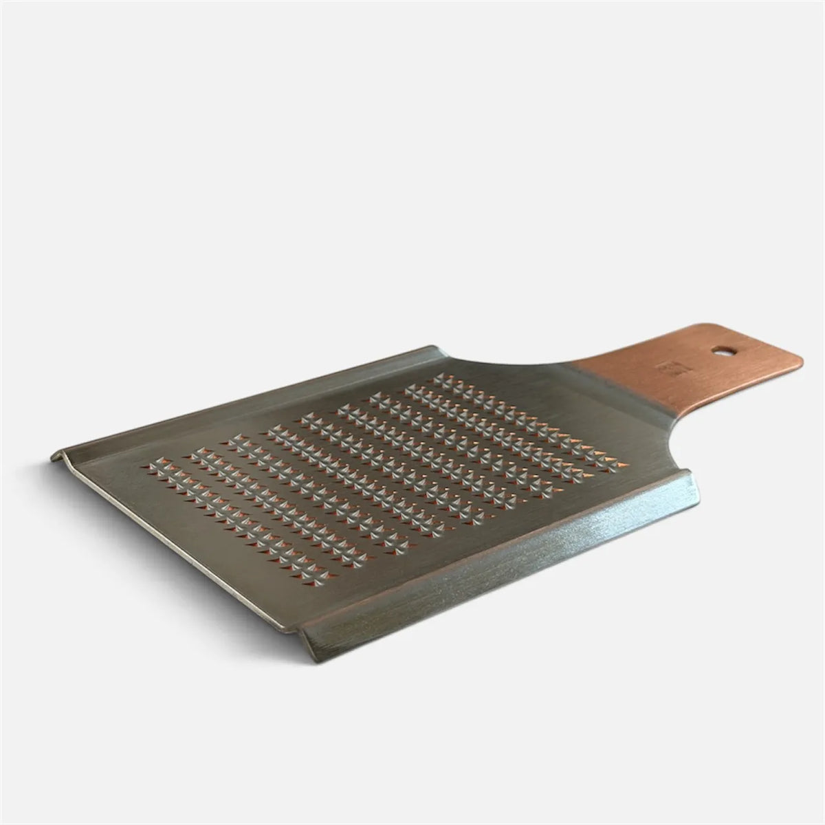 Coarse side of the copper oroshigane grater