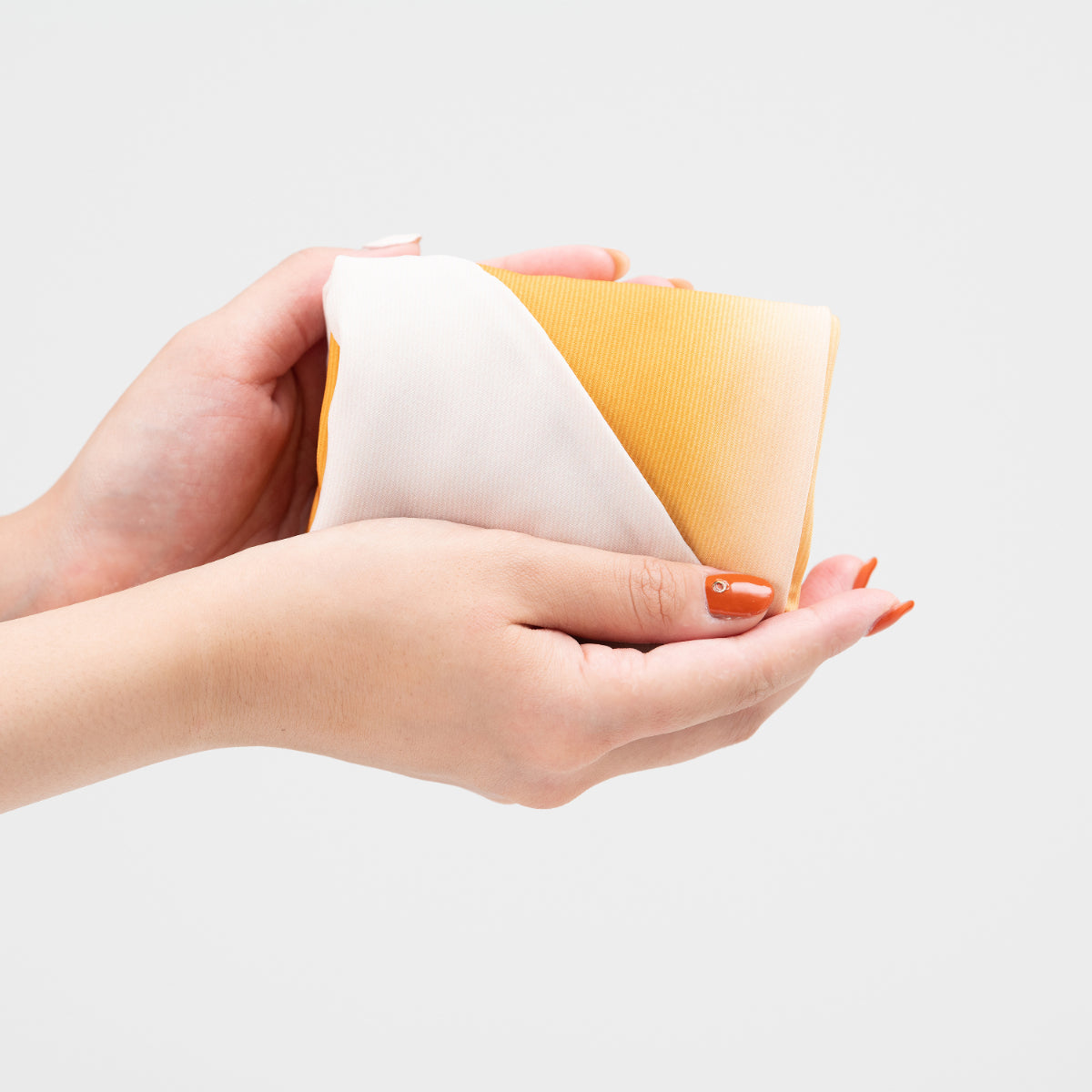 AZUMA bag folded small enough to fit in the palm of a hand