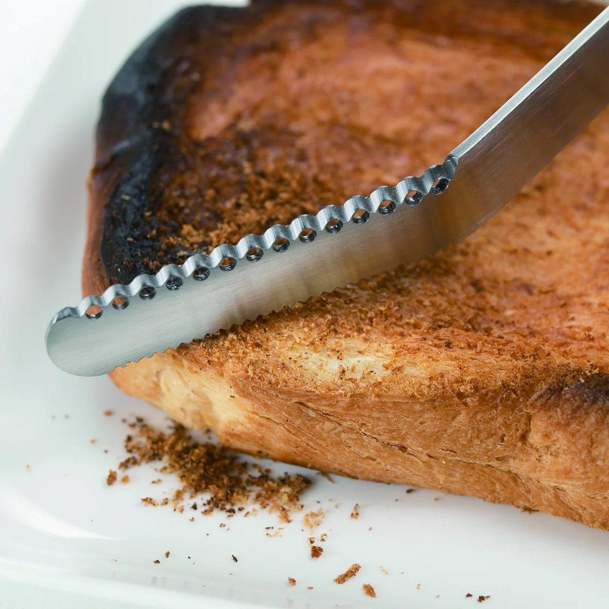 Nulu serrated edge scraping burnt toast