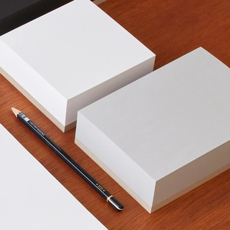 ITO BINDERY memo blocks on a desk with a pencil