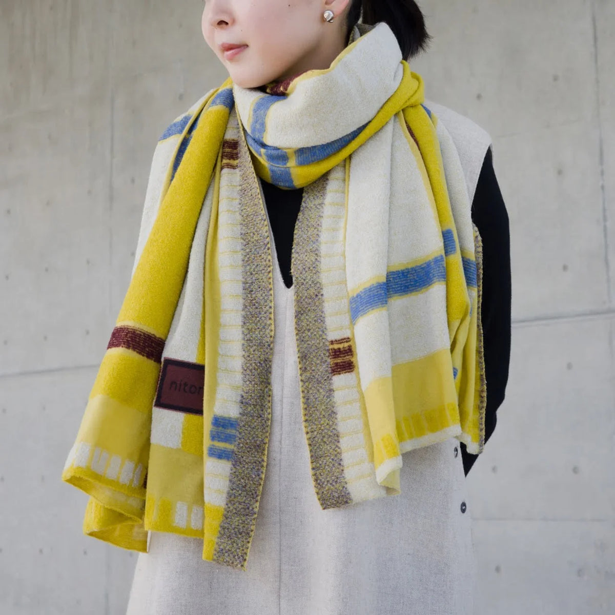 Wearing the yellow nitorito tanbo stole