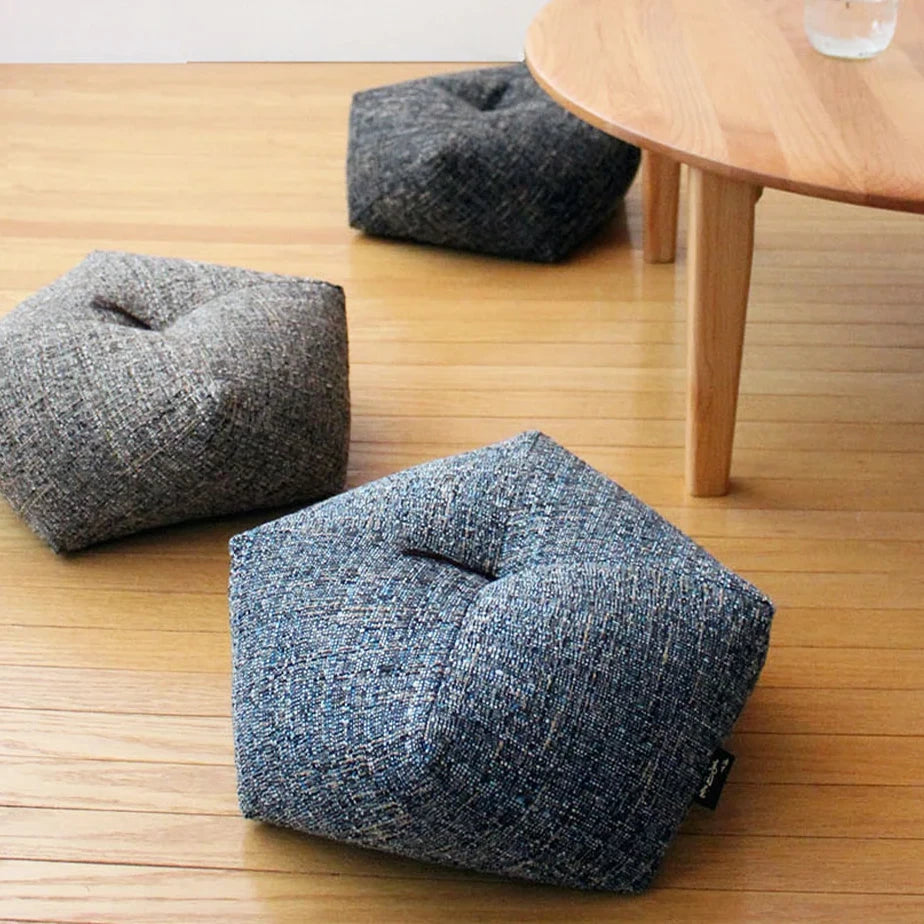 Ojami cushions Blendel on a wooden floor