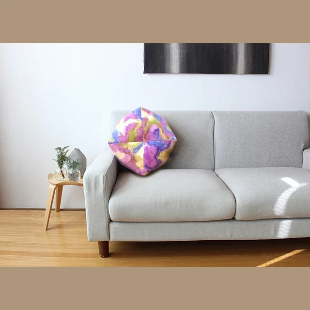 Ojami cushion Some no Sakira on a sofa
