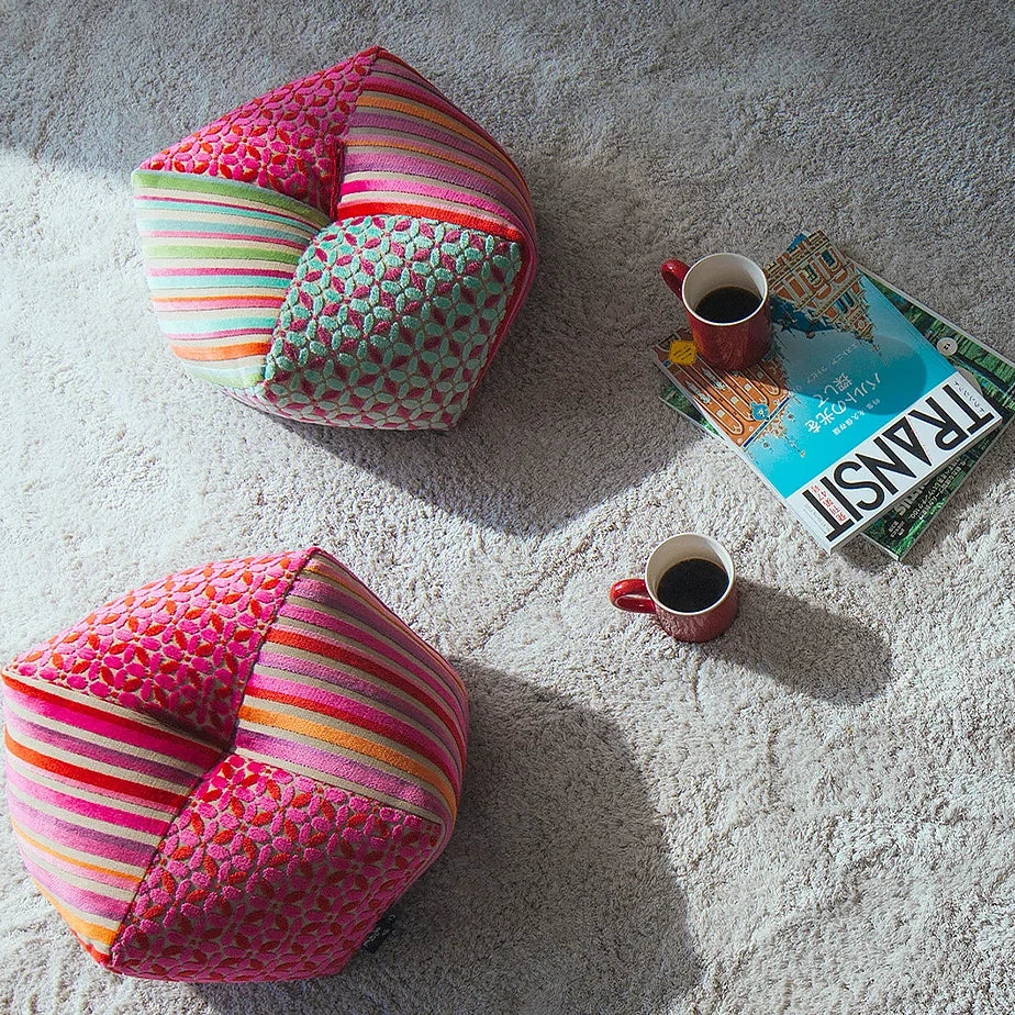 Ojami cushions Casamance on a rug