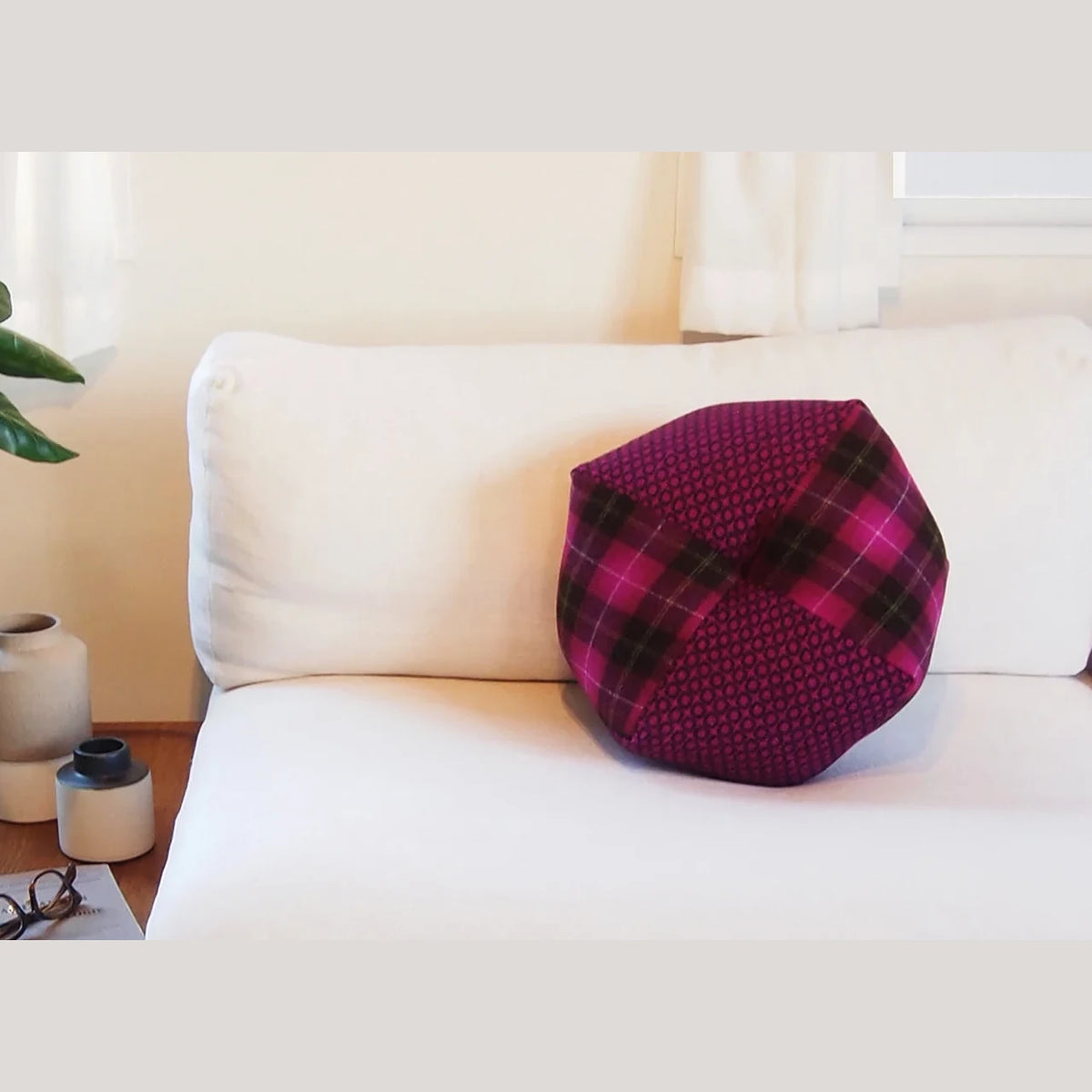 Ojami cushion Moon wool on a white sofa