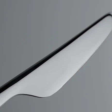 Close-up of the rounded tip and edge of a THE knife