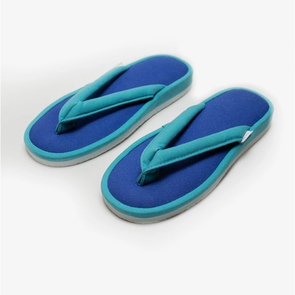 Turquoise blue canvas zori room sandals, angled view #Color_Turquoise Blue