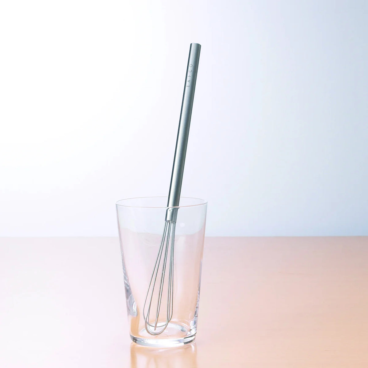 Mazelu mini whisk standing in a glass