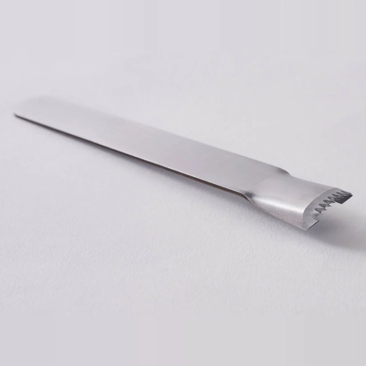 Poro stainless corn peeler, side view