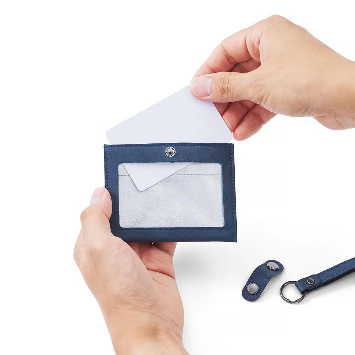 Detaching the leather strap from the hmny ID holder