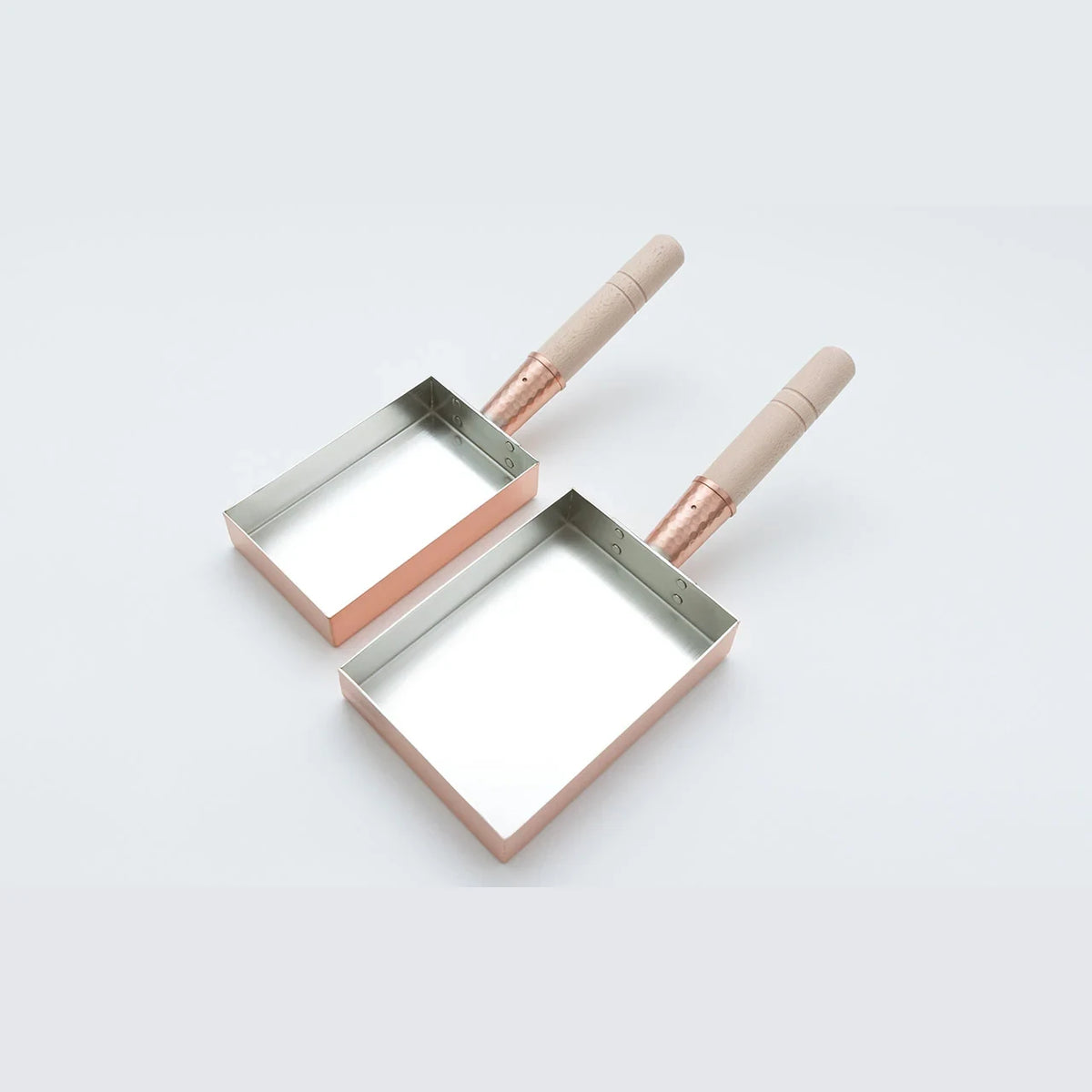Two sizes of the Kobo Aizawa copper tamagoyaki pan
