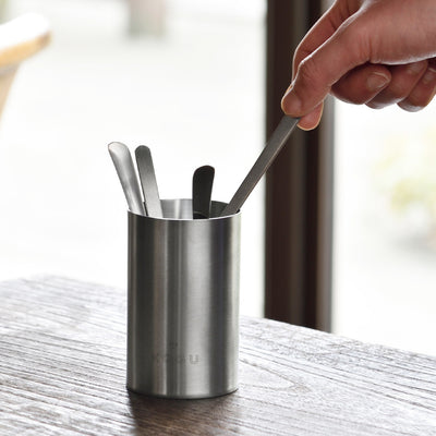 Stainless steel cutlery stand holding coffee spoons and tools