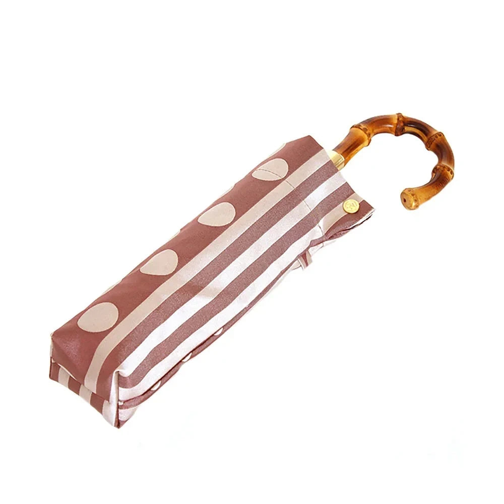 kirie Dots and Stripes folding umbrella in Antique Bordeaux, folded #Color_Antique Bordeaux