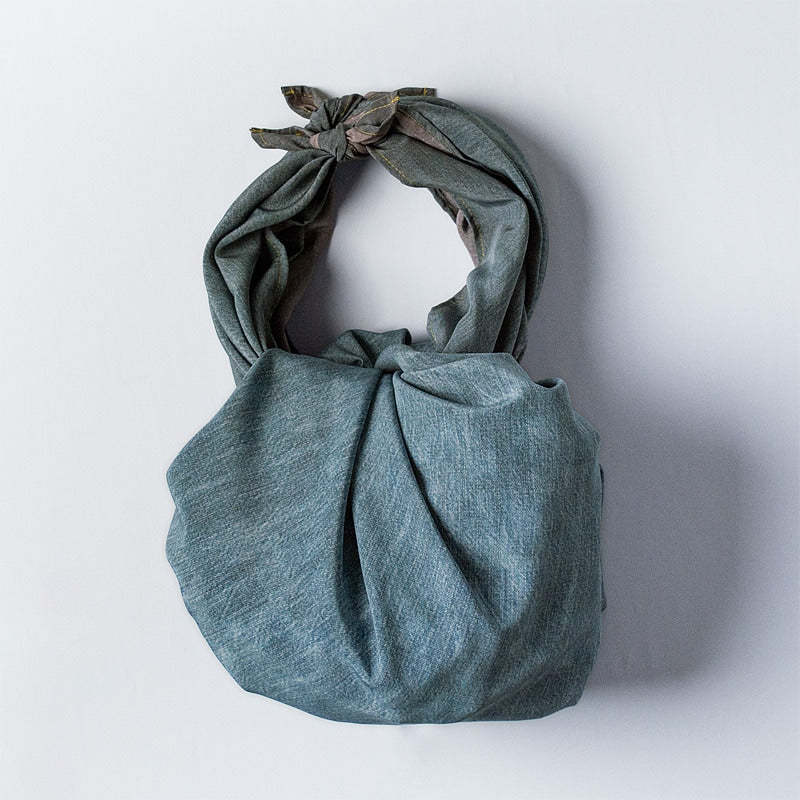 NAGARE furoshiki in Denim pattern tied as a shoulder bag #Pattern_Denim