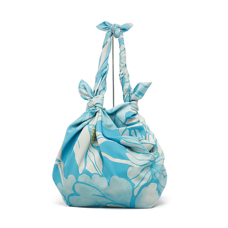 NAGARE furoshiki in Peony & Chrysanthemum pattern tied as a shoulder bag #Pattern_Peony & Chrysanthemum