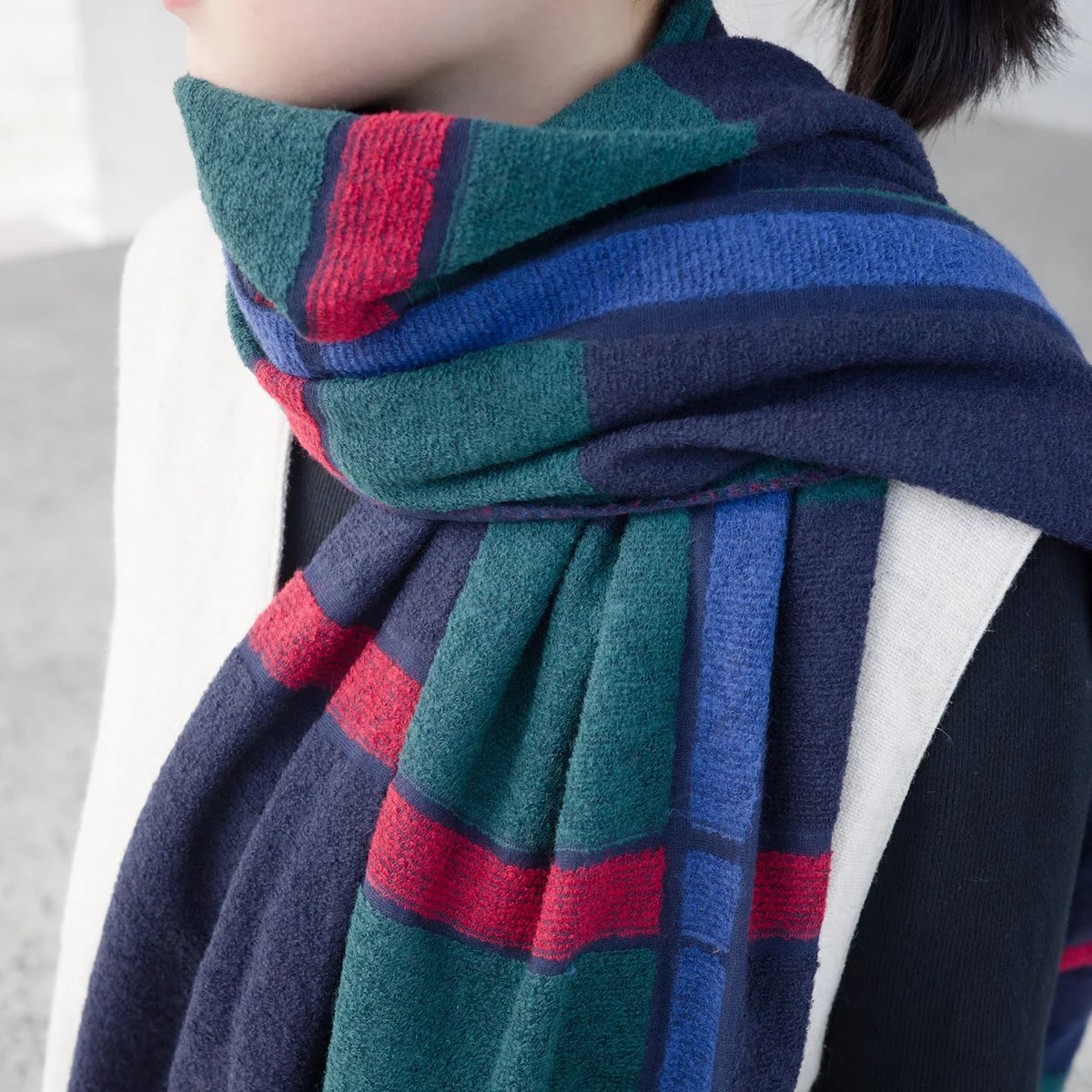Wearing the navy nitorito tanbo stole