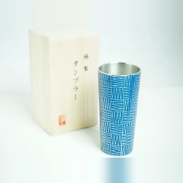 Ichimatsu tin tumbler beside its paulownia wood box