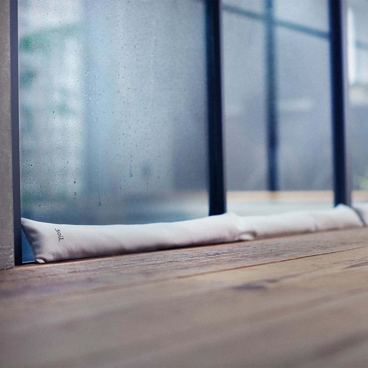 soil drying tube by a window to absorb condensation