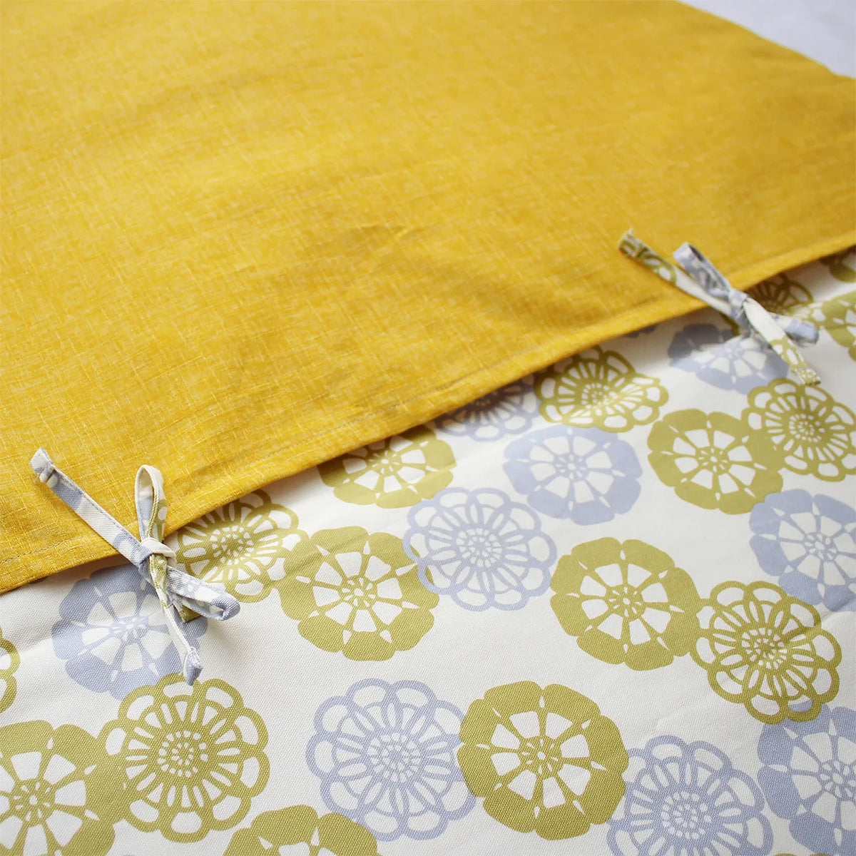 Tie closures on the senbei cushion cover