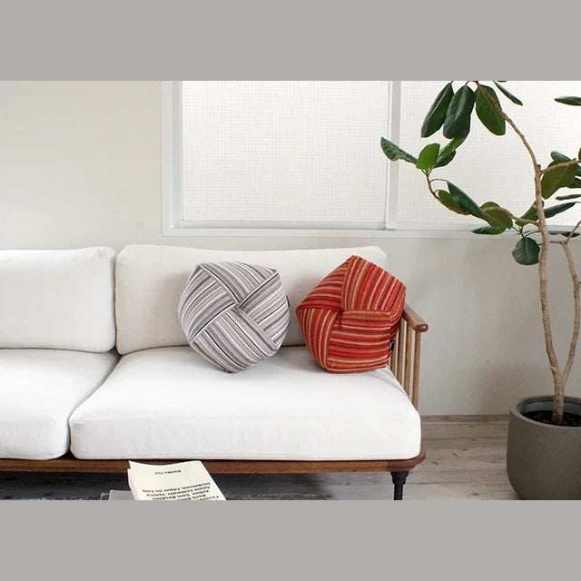 Ojami cushions Graph on a white sofa