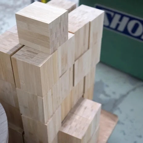 Blocks of laminated bamboo at the TEORI workshop
