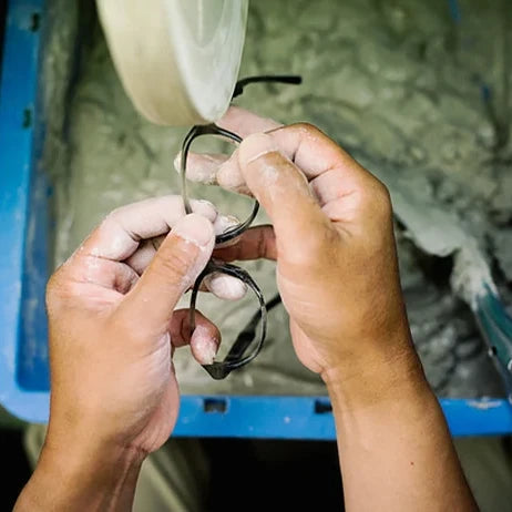 A craftsman at Taniguchi Megane in Sabae finishing a frame