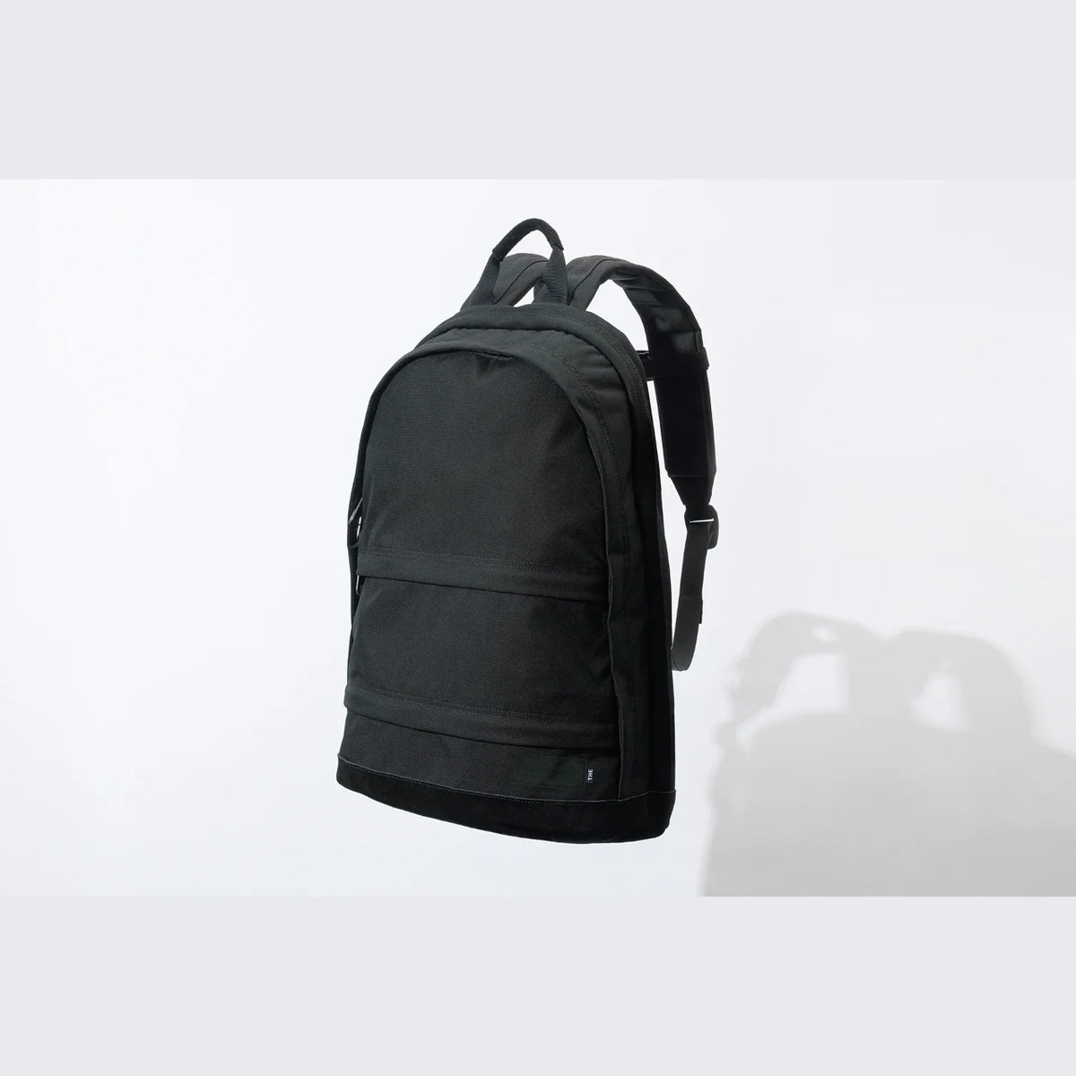 THE DAY PACK with a laptop in the back compartment